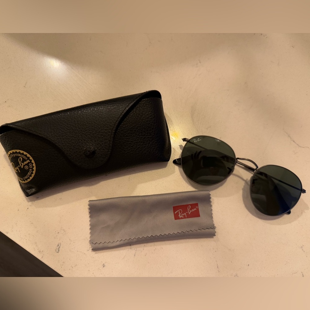 Rayban Sunglasses with thin frames, cleansing cloth and carrying case included